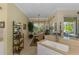 Bright dining area with views to lanai and comfortable seating at 14270 Reserve Ct, Port Charlotte, FL 33953