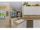 Well-lit kitchen space featuring stainless steel appliances and a clear view of the outdoor patio at 14270 Reserve Ct, Port Charlotte, FL 33953