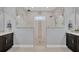 Sleek bathroom with frameless glass shower, dual vanities, and stylish finishes, creating a spa-like experience at 14286 Fort Worth Cir, Port Charlotte, FL 33981