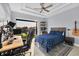 Bedroom with sliding glass doors to the outdoors, a ceiling fan, and stylish furniture at 14286 Fort Worth Cir, Port Charlotte, FL 33981