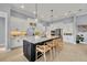 Modern kitchen featuring a large island and stainless steel appliances, perfect for culinary enthusiasts at 14286 Fort Worth Cir, Port Charlotte, FL 33981