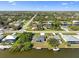 Waterfront homes showcase access to canals and waterways with picturesque views of the surrounding community at 15251 Appleton Blvd, Port Charlotte, FL 33981