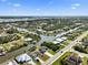 Expansive aerial view of a waterfront community with canals and coastal access at 15251 Appleton Blvd, Port Charlotte, FL 33981