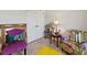 Spare bedroom with interesting furniture, decor and wood floors at 15251 Appleton Blvd, Port Charlotte, FL 33981