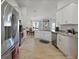 Kitchen featuring stainless steel appliances, white cabinets and granite countertops at 15251 Appleton Blvd, Port Charlotte, FL 33981