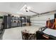 Spacious garage includes storage cabinets, ample workspace, and an overhead door at 15738 Applewhite Cir, Port Charlotte, FL 33981