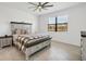 Cozy bedroom with neutral decor, a large window, and stylish furnishings creates a relaxing retreat at 1758 Saddlewood Cir, Port Charlotte, FL 33953