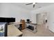 Spacious office area with multiple workstations and a view to an ensuite bathroom at 1758 Saddlewood Cir, Port Charlotte, FL 33953