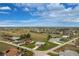 Wide aerial shot of a golf community and single-story homes, showing well-maintained landscaping at 2 Bunker Way, Rotonda West, FL 33947