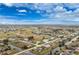 Wide aerial shot of a community showing single-Gathering homes, golf courses, and lakes at 2 Bunker Way, Rotonda West, FL 33947