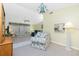 Bright living room offering ample seating, neutral tones, and seamless flow at 2 Bunker Way, Rotonda West, FL 33947