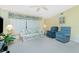 Bright and open living area with ample seating and a large window at 2 Bunker Way, Rotonda West, FL 33947