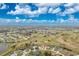 Wide aerial shot of a residential community on a golf course at 20 Bunker Way, Rotonda West, FL 33947
