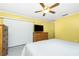 Spacious bedroom featuring a flat-screen television and a sliding glass door at 20 Bunker Way, Rotonda West, FL 33947