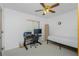Cozy bedroom featuring a ceiling fan and desk setup, perfect for a home office at 20 Bunker Way, Rotonda West, FL 33947