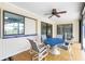 Inviting lanai area with tile flooring, fan, table, and chairs offers a relaxing outdoor space at 20 Bunker Way, Rotonda West, FL 33947