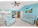 Comfortable living room with plush furniture and a view of the pool area at 20 Bunker Way, Rotonda West, FL 33947