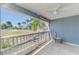 Screened balcony with tile floor offers a beautiful view of the green space at 200 Rotonda W Blvd # A2, Rotonda West, FL 33947