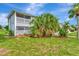 Charming two-story condo with screened patios and tropical landscaping in a desirable community at 200 Rotonda W Blvd # A2, Rotonda West, FL 33947
