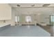 View from kitchen, showcasing updated floors and ample natural light at 200 Rotonda W Blvd # A2, Rotonda West, FL 33947