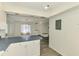 View from kitchen, showing an open floor plan with dining and living areas at 200 Rotonda W Blvd # A2, Rotonda West, FL 33947