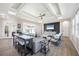 Bright living room with high ceilings, stylish furniture, and a view of the pool at 213 Sunset Rd, Rotonda West, FL 33947