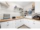 Walk-in pantry featuring ample storage space with shelves and countertops at 213 Sunset Rd, Rotonda West, FL 33947
