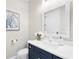 Stylish powder room with elegant vanity, modern fixtures, and beautiful decor at 213 Sunset Rd, Rotonda West, FL 33947