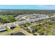 Discover this waterfront community with lush trees, serene ponds, and a walking trail at 284 Talquin Ct, Englewood, FL 34223
