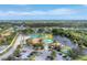 Beautiful community features a pool, clubhouse, tennis courts, and a scenic lake at 284 Talquin Ct, Englewood, FL 34223