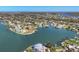 Aerial view of the property showcasing its waterfront location and proximity to nearby amenities and waterways at 400 Anchor Row, Placida, FL 33946