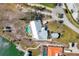 Birds eye view of the home, pool, boat dock, and property at 400 Anchor Row, Placida, FL 33946