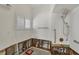 Renovated bathroom featuring white tiled shower, modern fixtures, and natural light at 400 Anchor Row, Placida, FL 33946