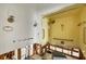 Bathroom featuring a yellow tiled shower, updated fixtures, and exposed studs at 400 Anchor Row, Placida, FL 33946