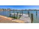 Waterfront view of private dock leading out onto the bay at 400 Anchor Row, Placida, FL 33946