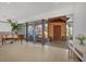 Bright living area featuring natural light, tile flooring, and sliding glass doors to the yard at 400 Anchor Row, Placida, FL 33946