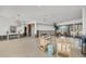 Large living room with an open layout and waterfront views offers many possibilities for modern customization at 400 Anchor Row, Placida, FL 33946