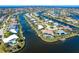 Gorgeous waterfront property with private dock and lush landscaping, offering serene canal views and outdoor living at 471 Capri Isles Ct, Punta Gorda, FL 33950