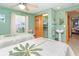 Bedroom with twin beds, closet, sink, and view to the bedroom next door at 471 Capri Isles Ct, Punta Gorda, FL 33950