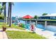 Waterfront property featuring a private dock, boat lift, and canal views at 471 Capri Isles Ct, Punta Gorda, FL 33950