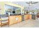 Bright kitchen featuring granite counters, stainless steel appliances and tile flooring at 471 Capri Isles Ct, Punta Gorda, FL 33950