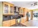 Gourmet kitchen with custom cabinetry, granite countertops, and stainless steel appliances at 471 Capri Isles Ct, Punta Gorda, FL 33950