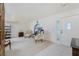 Bright living room featuring tile entryway, white walls, and comfortable seating at 51 Mark Twain Ln, Rotonda West, FL 33947