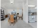 Open-concept living and dining area with neutral decor and ample natural light at 51 Mark Twain Ln, Rotonda West, FL 33947