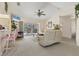 A comfortable living room with access to the outdoor patio and pool area, perfect for entertaining at 5258 Grassland Ter, Port Charlotte, FL 33981