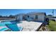 Enjoy the backyard pool, comfortable seating, and a relaxing patio area for leisure and entertaining at 5388 Montego Ln, Port Charlotte, FL 33981