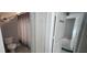 Bathroom featuring shower with curtain, toilet, and access to other rooms at 5388 Montego Ln, Port Charlotte, FL 33981
