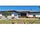 Charming single-story home with well-maintained lawn, landscape beds, and a two-car garage at 5388 Montego Ln, Port Charlotte, FL 33981