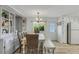 Charming dining area with a built-in cabinet, and a rustic wooden table with a bench at 5619 Bayshore Rd # 240, Palmetto, FL 34221
