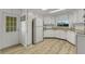 Spacious kitchen with ample storage, complete with modern appliances and stylish flooring at 5619 Bayshore Rd # 240, Palmetto, FL 34221